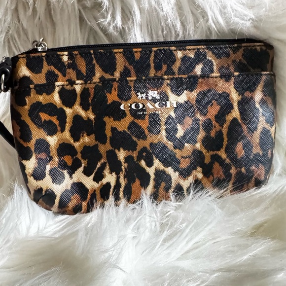 Coach Handbags - Coach Leopard Print Clutch